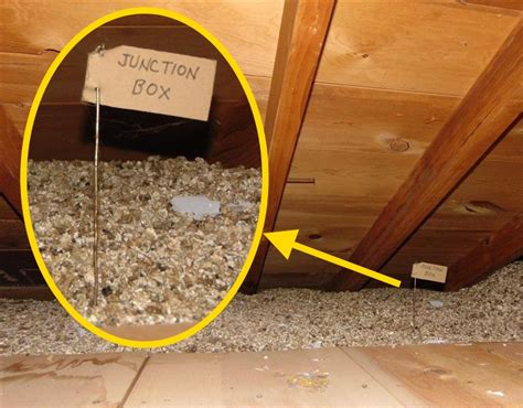 insulation around electrical junction boxes in an attic|covering attic junction boxes.